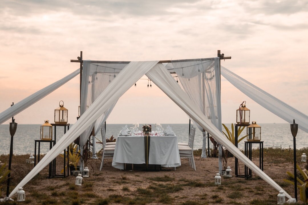 Outdoor dinner table set at sunset near the beach in José Ignacio