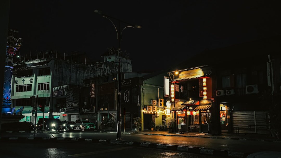 cityscape with shops at night